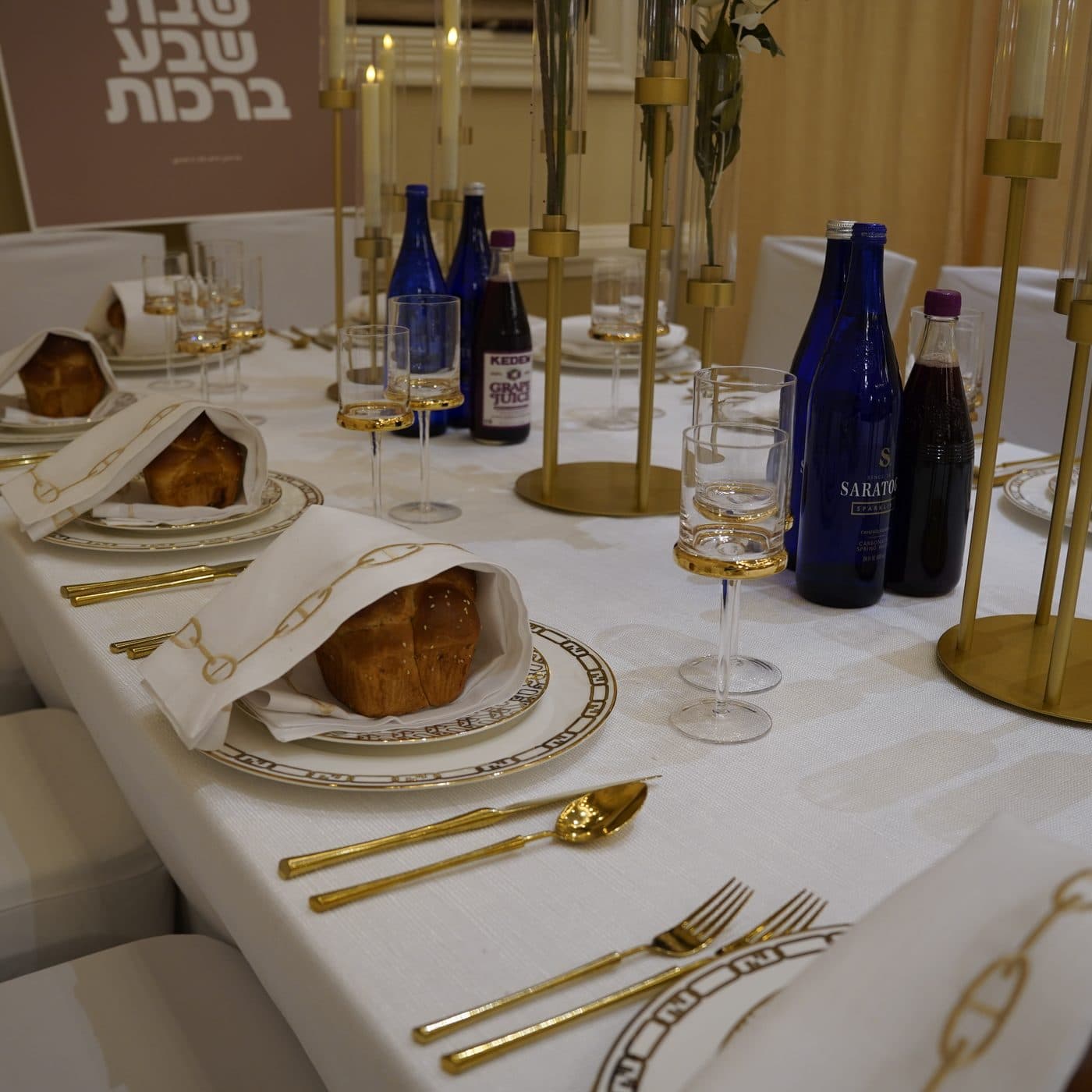 A sheva brachos table, dressed and plated