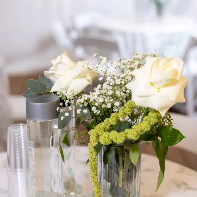 Flowers and centerpieces arranged by Mashmanim